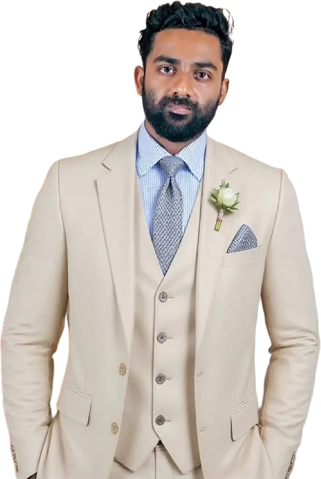 KH Shifat, web designer and developer, in a beige three-piece suit